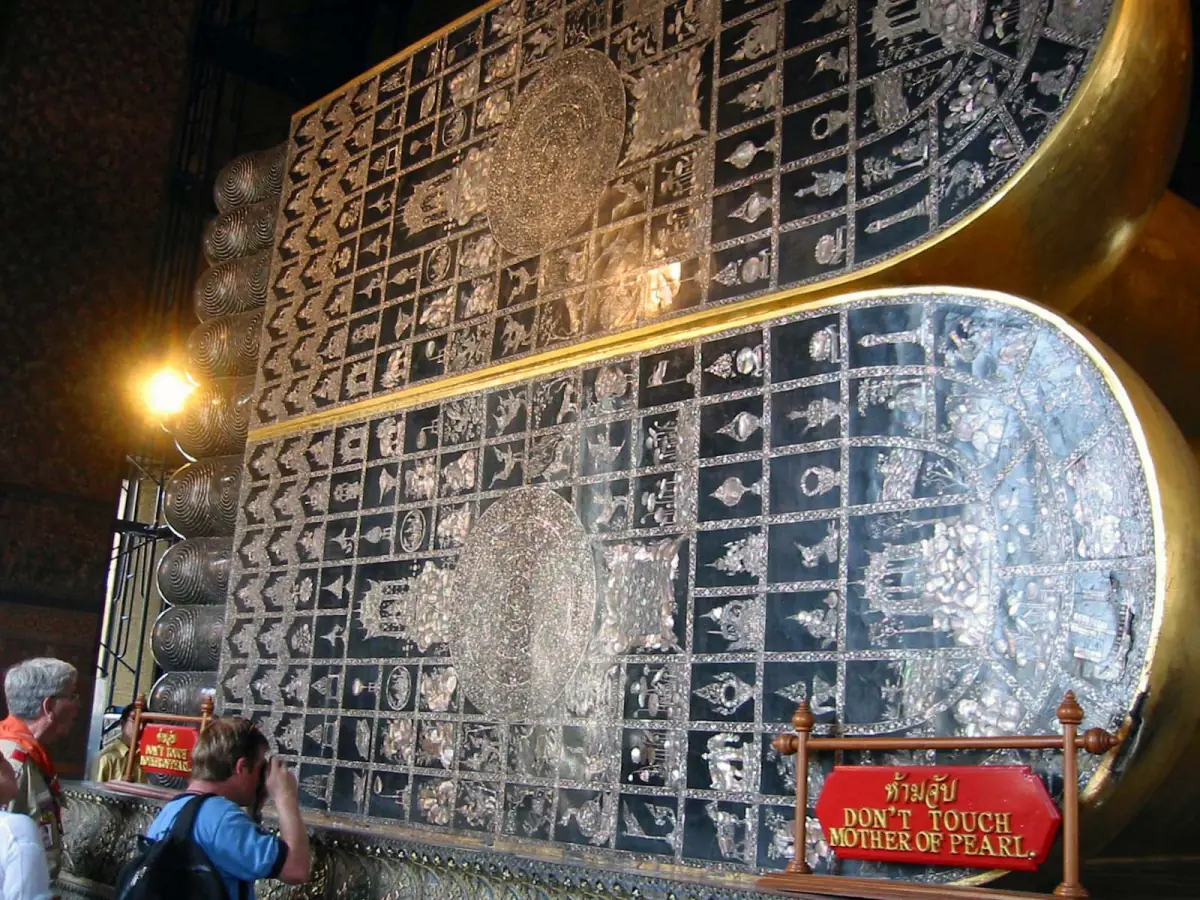 The mother-of-pearl soles of the Reclining Buddha's feet