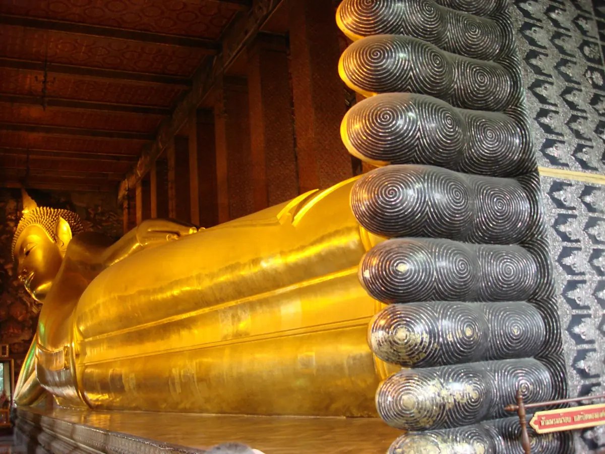 The gold-plated Reclining Buddha in its hall at Wat Pho