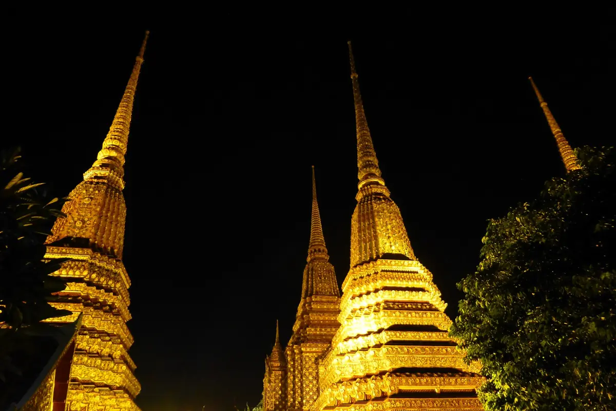 Chedis at Wat Pho lit up at night
